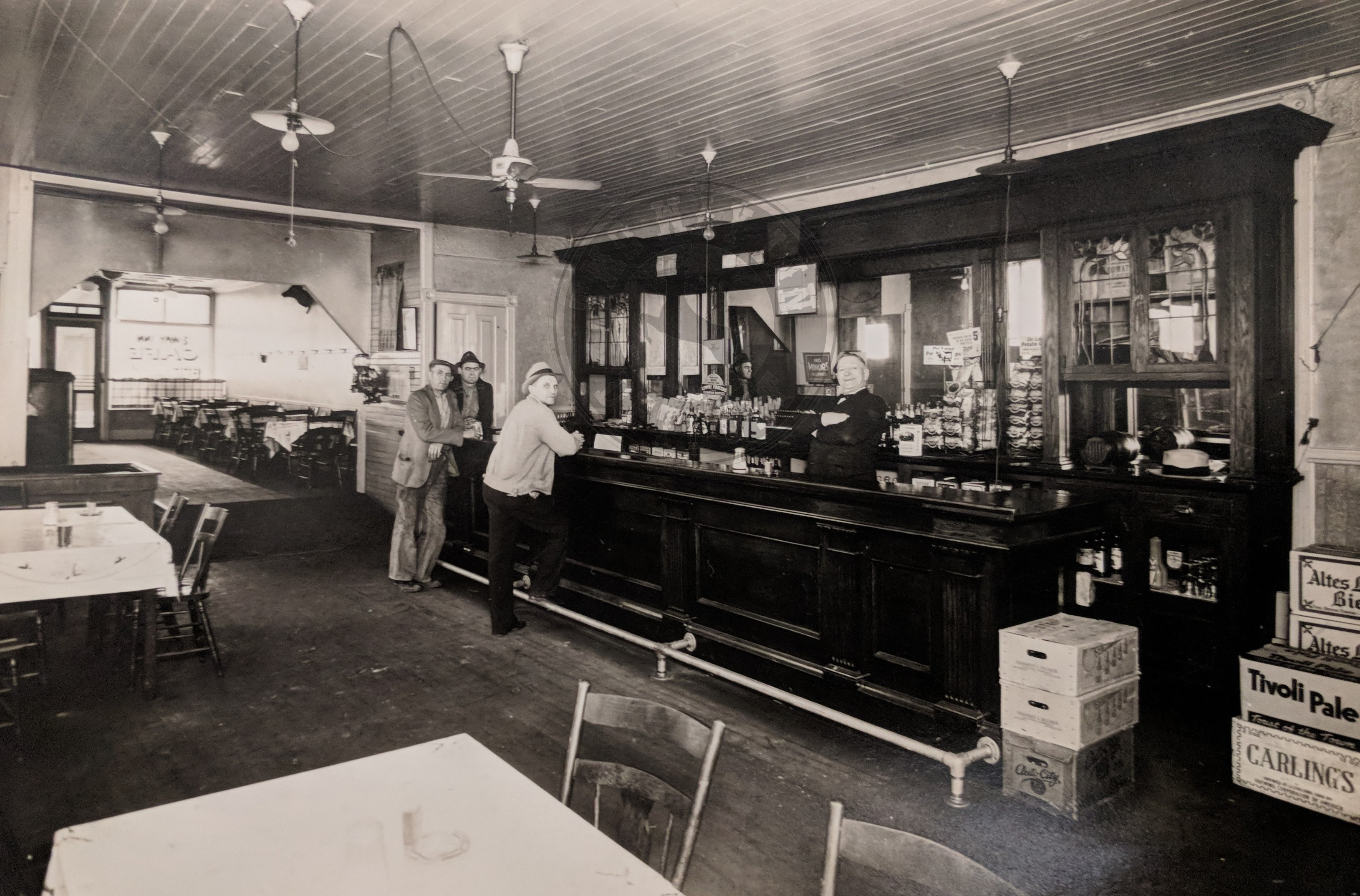 Historic photo of patrons gathered at the Two Way Inn in an earlier era